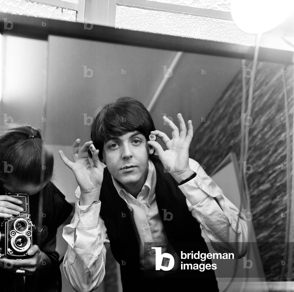 The Beatles pose for pictures during filming of A Hard Day's Night at Madame Tussauds in London 12th March 1964.