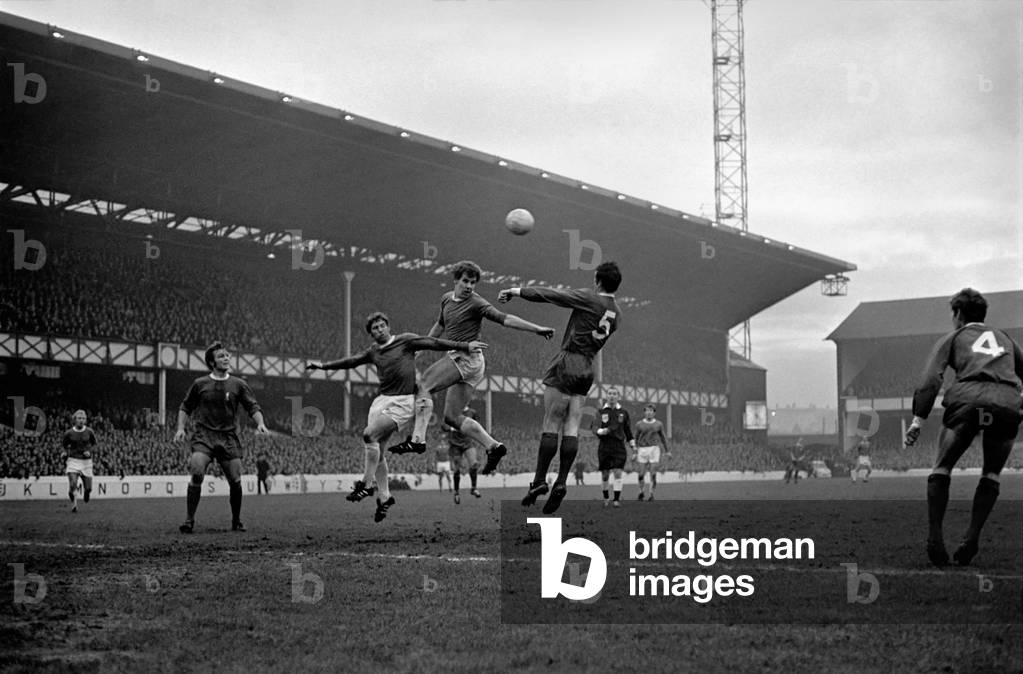 English League Division One match at Goodison Park. Everton 0 v Liverpool 3Joe Royle beats Liverpool defenders but heads wide. December 1969 (photo)