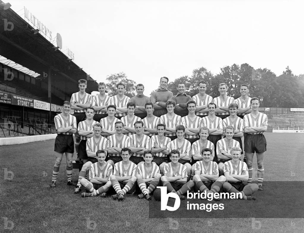 Southampton FC Football Players, 1958 - 1959 Season. 19th August 1958. Back Row L2RColin HolmesRon DaviesTommy TrainorTony GodfreyBryan StevensJohn ChristieJohn PageBarry HillerByrn Elliott3rd Row L2RCharlie LiverseyGraham ClarkeJimmy ShieldsAndy McLeanJoe HarleyTerry SimpsonSam StevensJohnny HoskinsBrian CliftonPat Parker2nd Row L2RKen BirchDon RoperJohn BaileyTommy MulgrewBobby McLaughlinDerek ReevesFront Row L2RGeorge FryerTerry PaineJohn SydenhamPeter VineDavid ScurrTony Heaney (photo)