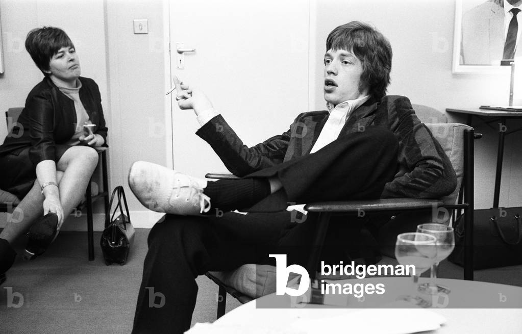 The Rolling Stones. Mick Jagger (Repetto) talks with the Press during a break in rehearsals at the Eamonn Andrews TV Show 
5th February 1967