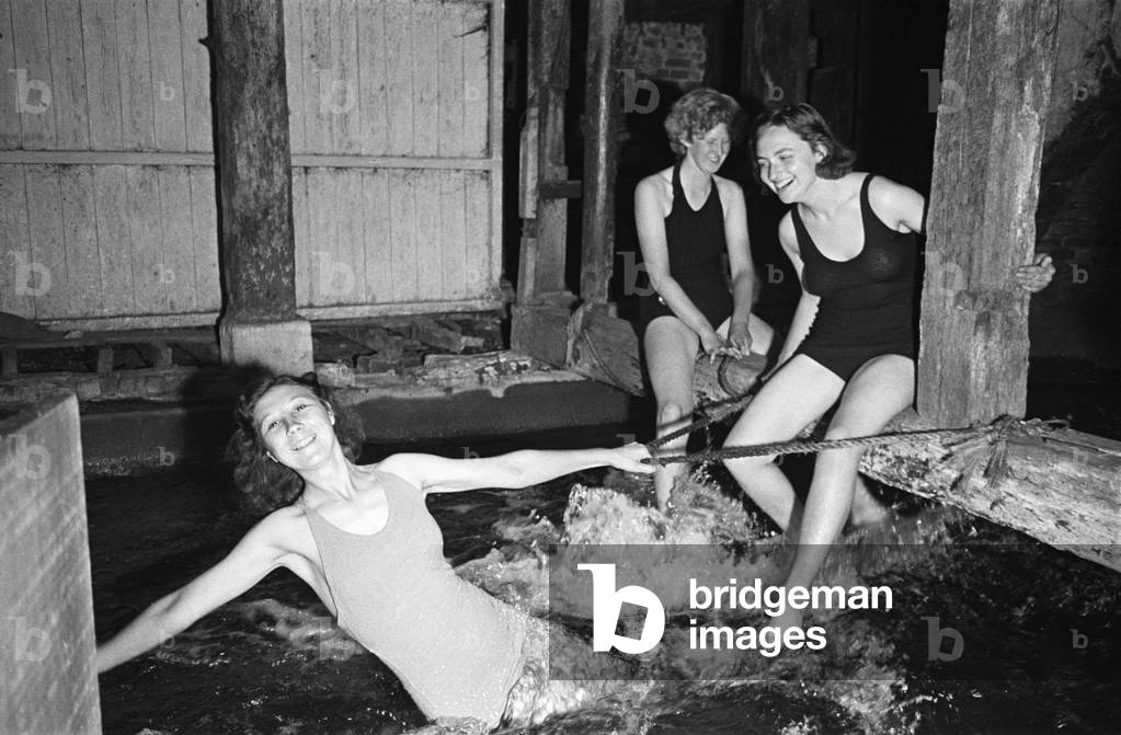 The Winchester City Mill is a restored water mill situated on the River Itchen in the centre of the ancient English city of Winchester, Hampshire. In 1932 the mill was leased to the Youth Hostels Association for use as a hostel, c. 1945 (b/w photo)