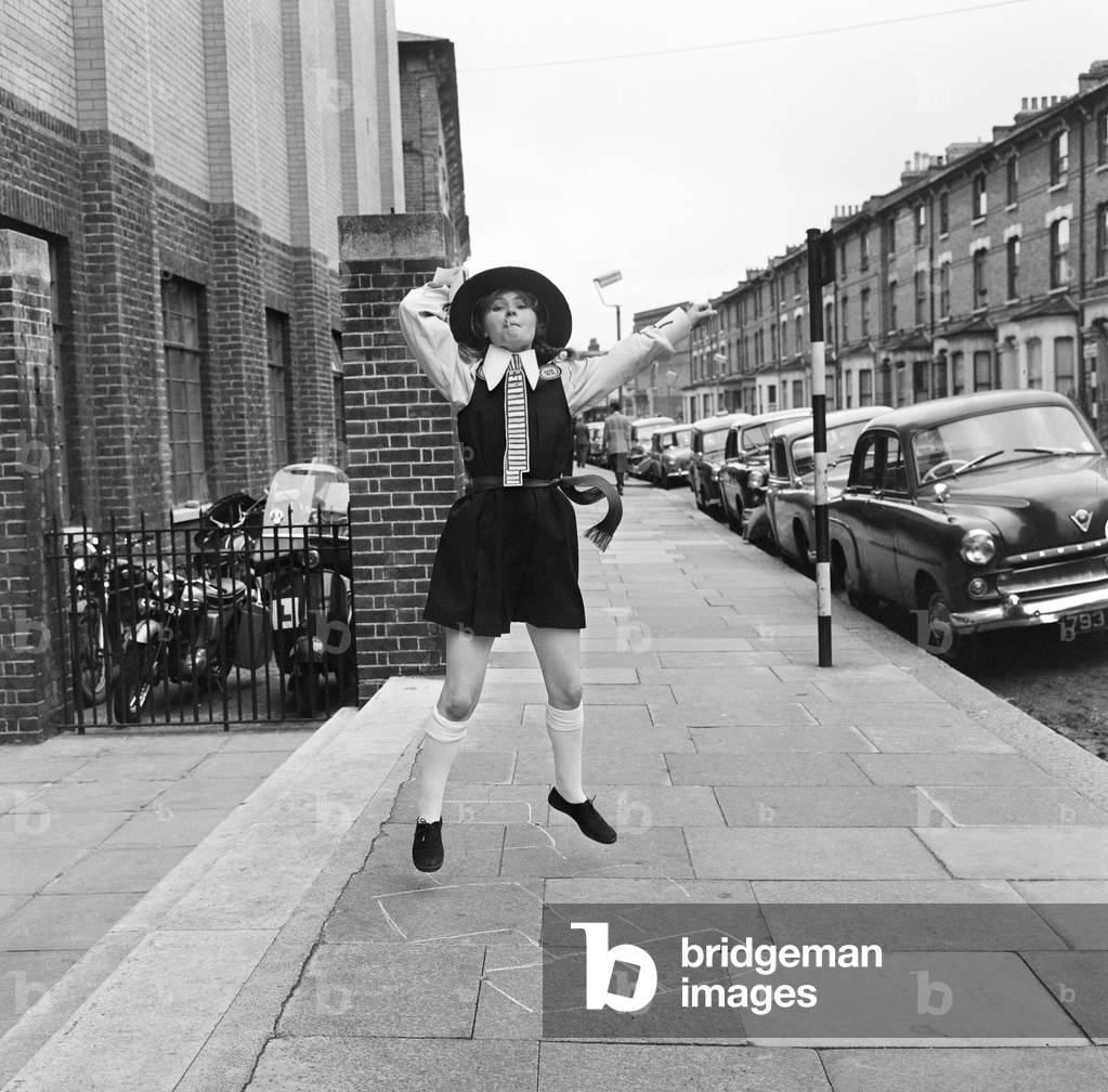 Prunella Scales, actress aged 29 years old, dressed as a naughty schoolgirl, 20th August 1962 (b/w photo)