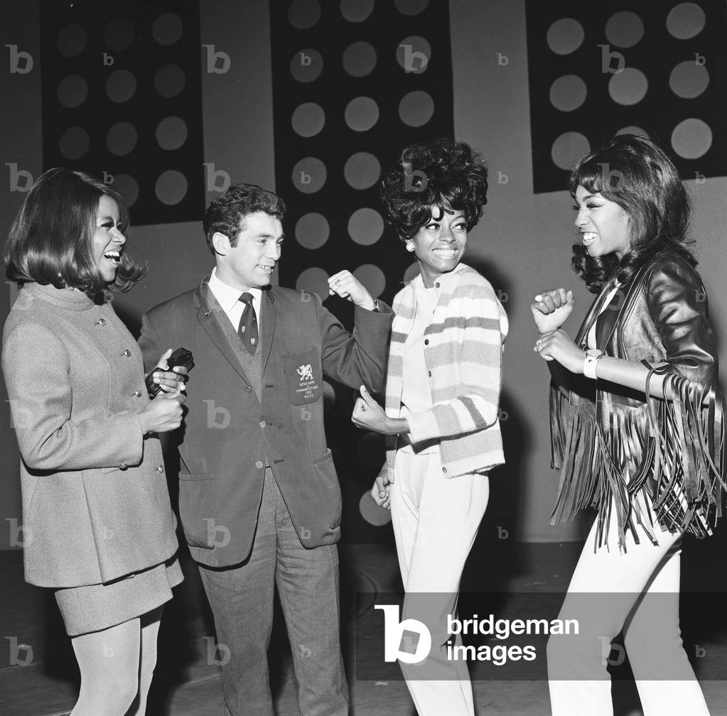 The Supremes meet Howard Winston, World Feather Weight Champion at the Palladium show. 28th January 1967 (b/w photo)
