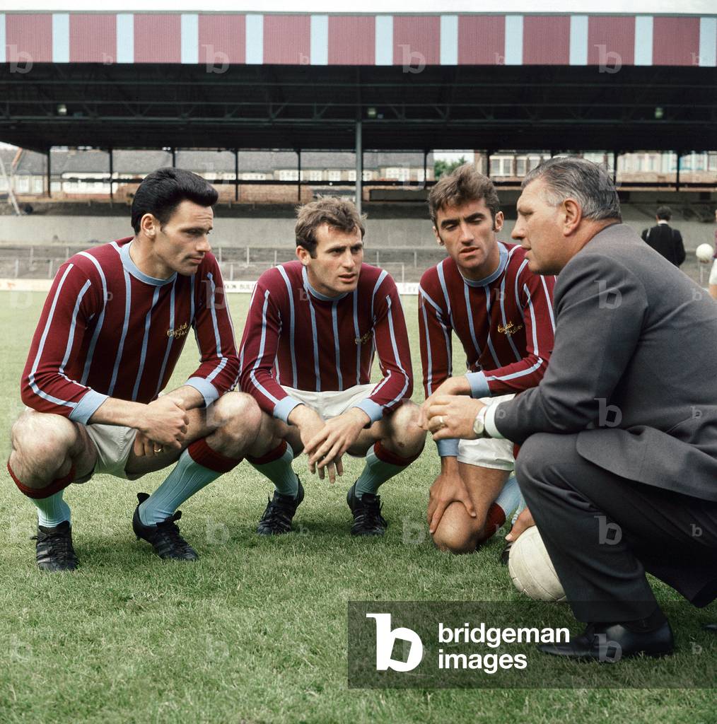 Crystal Palace manager Bert Head with new signings L-R:Roger Hynd, Alan Pinkney and Gerry Queen at Selhurst Park ahead of the 1969 - 1970 season. July 1969 (photo)