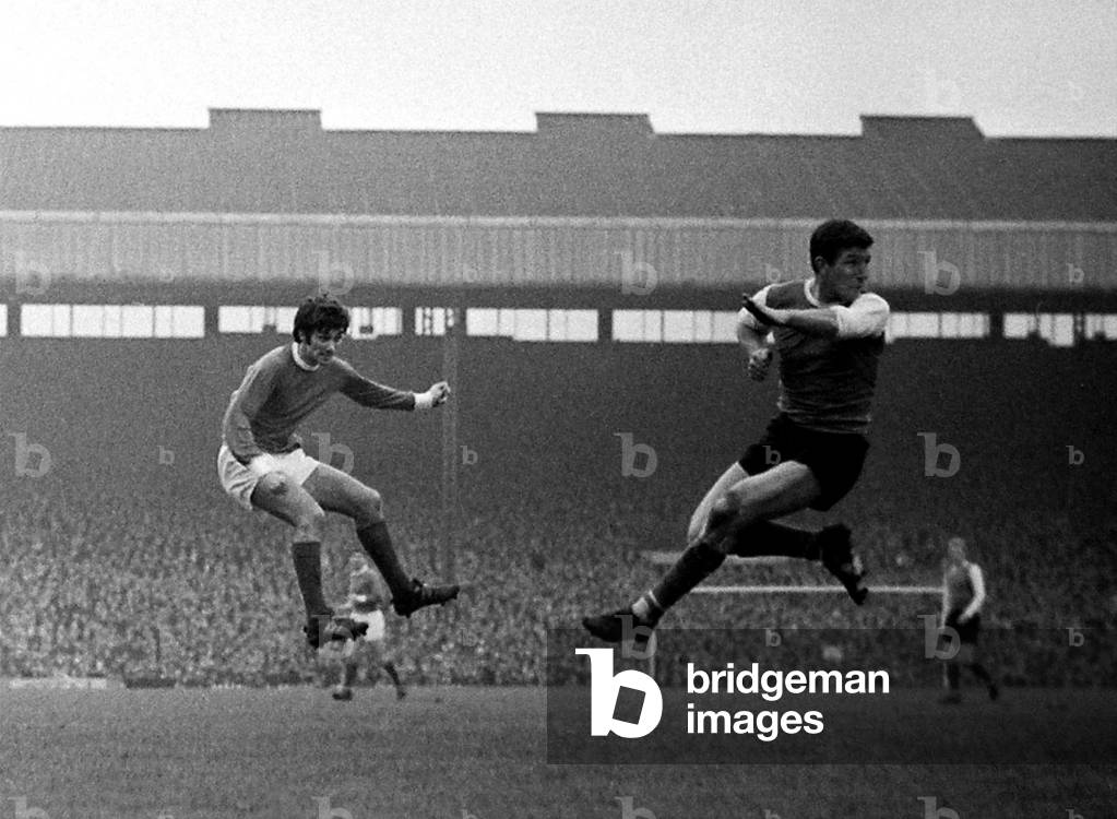 George Best shoots at goal for Manchester United past Sheffield Wednesday defender Johnny Fantham during their league match at Old TraffordJanuary 1968 (photo)