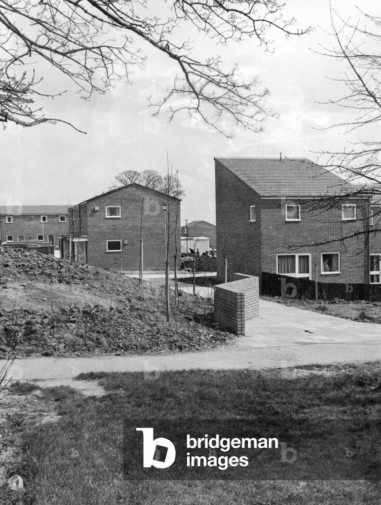 Tomorrow, North Housing Group's first 'new build' scheme will be completed at Blackfell, Washington New Town. The occasion will be marked at 2.30pm by a tree planting ceremony, performed by Sir James Steel, chairman of Washington Development Corporation. This small attractive scheme consists of 21 dwellings built in the traditional brick style with timber frame windows and tiled pitched roofs, and with gas central heating. 27th April 1976 (b/w photo)