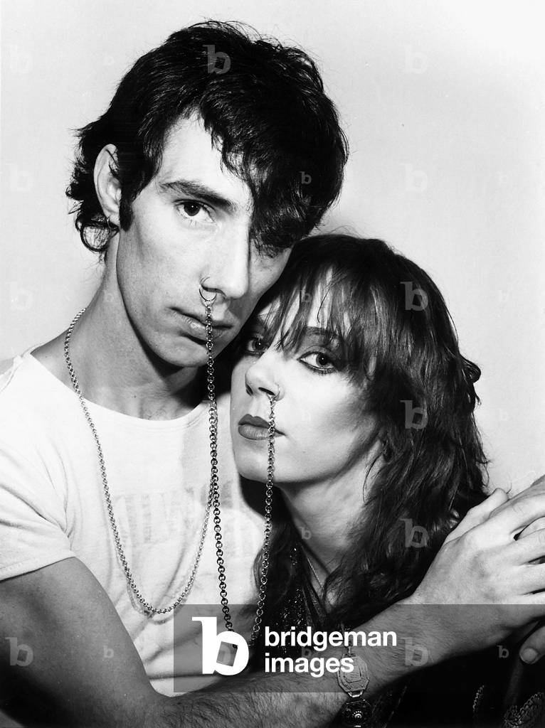 Phil Jones punk singer and girlfriend Mandy Todd 1982
pop group Afraid of Mice 
Nose rings linked by chain