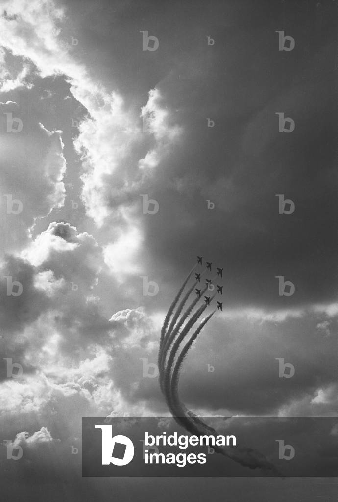 The Red Arrows in Diamond Nine formation seen here performing at RAF Scampton, Lincoln 29th April 1968