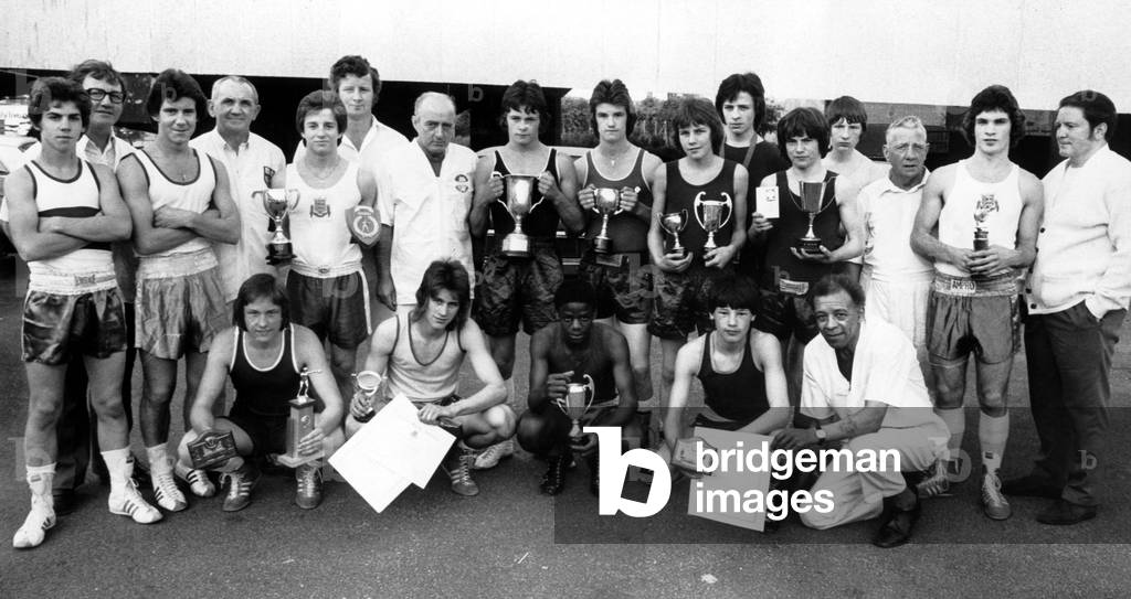 Warwickshire's amateur boxing internationals, champions and runners-up for 1974-75 with their trainers. 10th June 1975 (b/w photo)