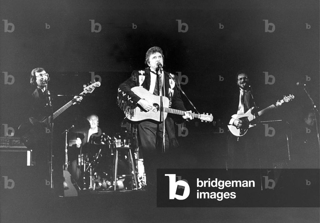Country and Western singer Johnny Cash performing at Bents Park, South Shields in 1987 (b/w photo)