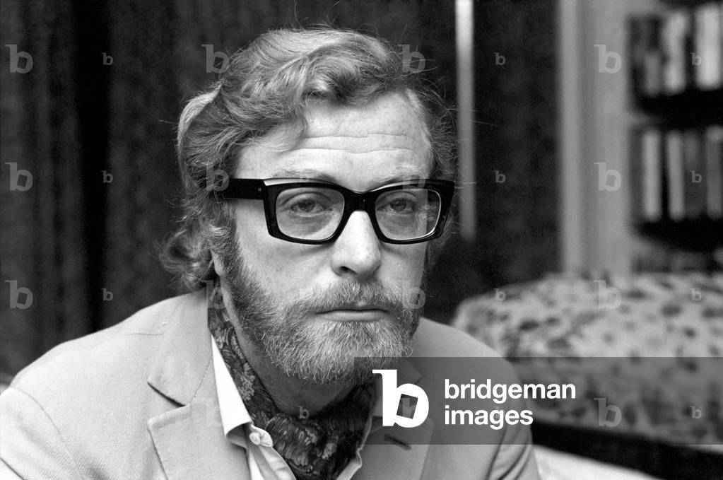 Actor Michael Caine pictured at his home in Grosvenor Square, also pictured is girlfriend Minda Feliciano from the Philippines. November 1969 Z11244-011