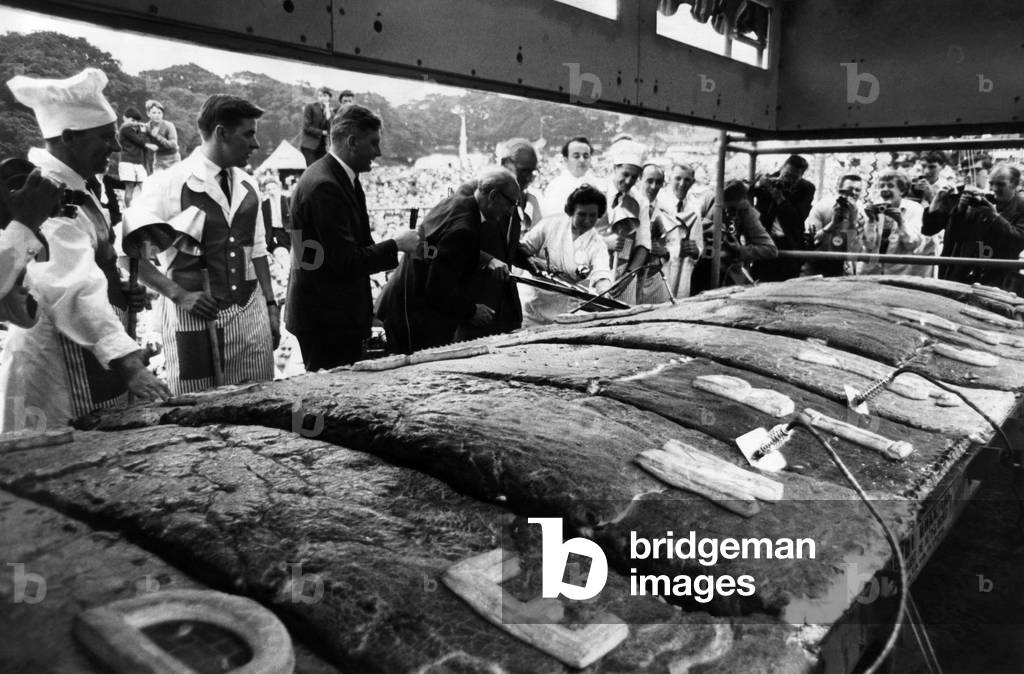 Mr. Jonas Kenyon cuts the first slice of Denby Dale's six-ton pie, September 1964