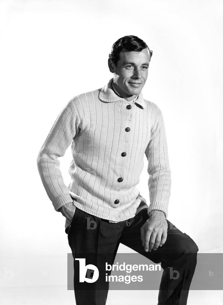 Model John Handy wearing cardigan in Reveille Studio . 1960