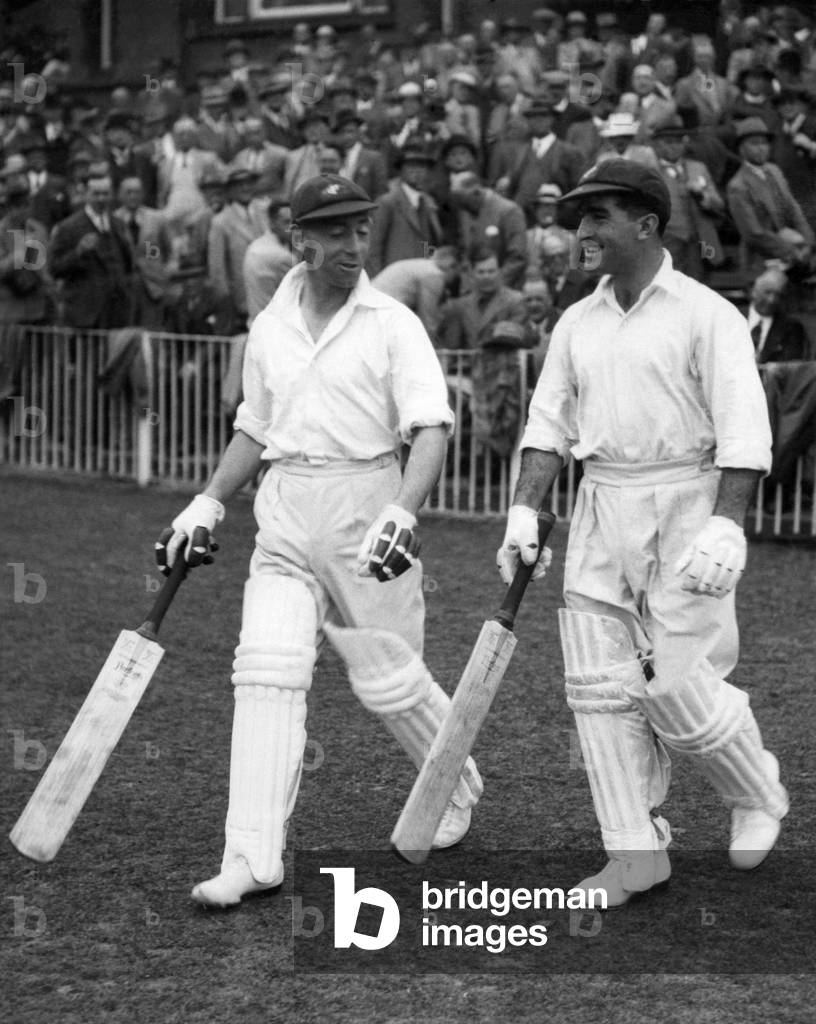 They had something to smile about. - Hassett and Badcock resuming their great recovery stand for Australia against Lancashire on Saturday afternoon. June 1938