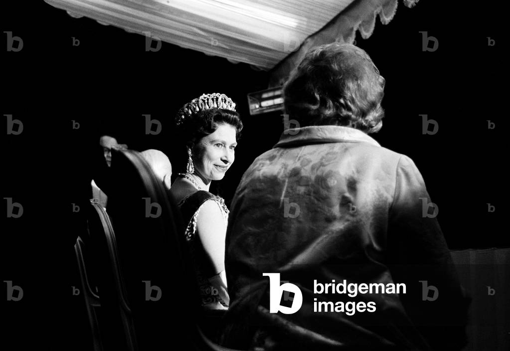 The Queen during her visit to West Germany, pictured watching the Tattoo in the gardens of Bruhl. 18th May 1965 (b/w photo)