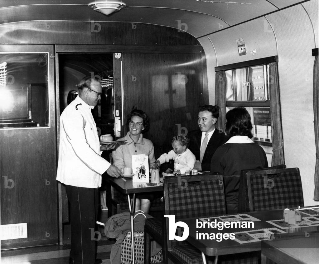 Railways - Buffet Service - Mr Bernard Bresner of Llanrumney, Cardiff serves travellers on the new griddle-service train with a pot of tea during their trip - 10th July 1963