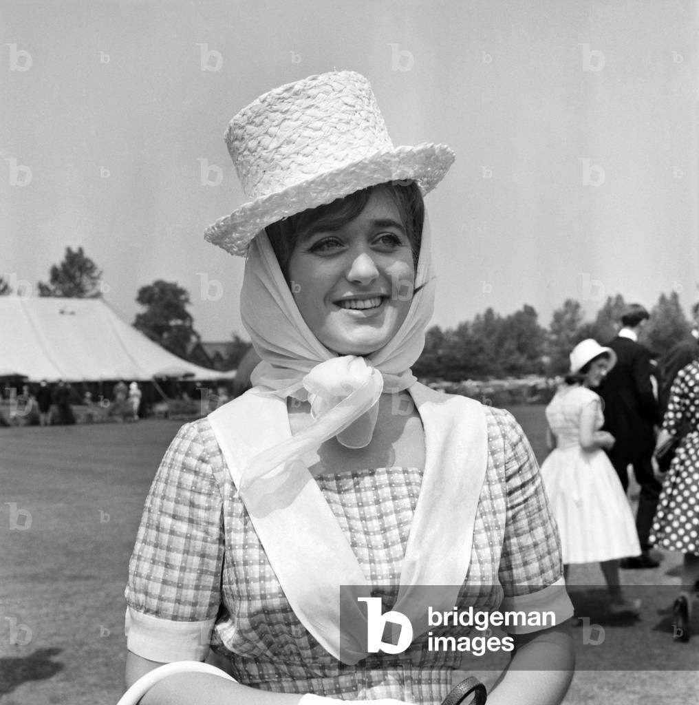 Eton Celebrations. 19 year old Georgina Scott from Chelsea wearing tall hat with silk attached at back pictured at Eton this weekend during the College celebrations
June 1960