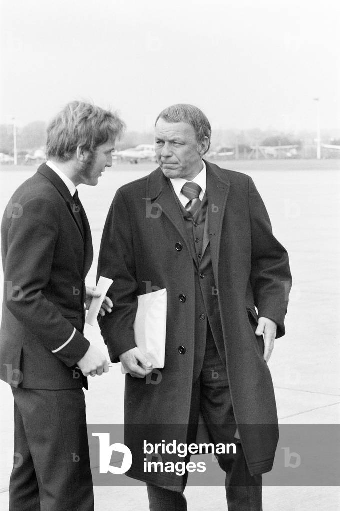 Frank Sinatra, flies into London Gatwick Airport, on his personal Gulf stream jet, Sunday 15th November 1970 (b/w photo)