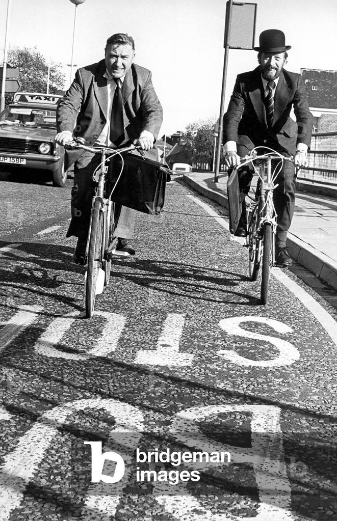 City businessmen Alan Brown and Jack Drury have turned to pedal power to beat the traffic jams, parking problems and meter restrictions to get to their offices on time, 1970