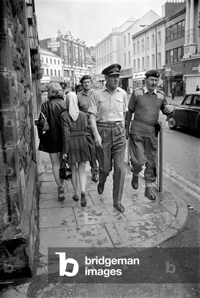 Northern Ireland August 1969. Chief of staff General Sir Geoffrey Baker seen here touring Londonderry talking to his troops.