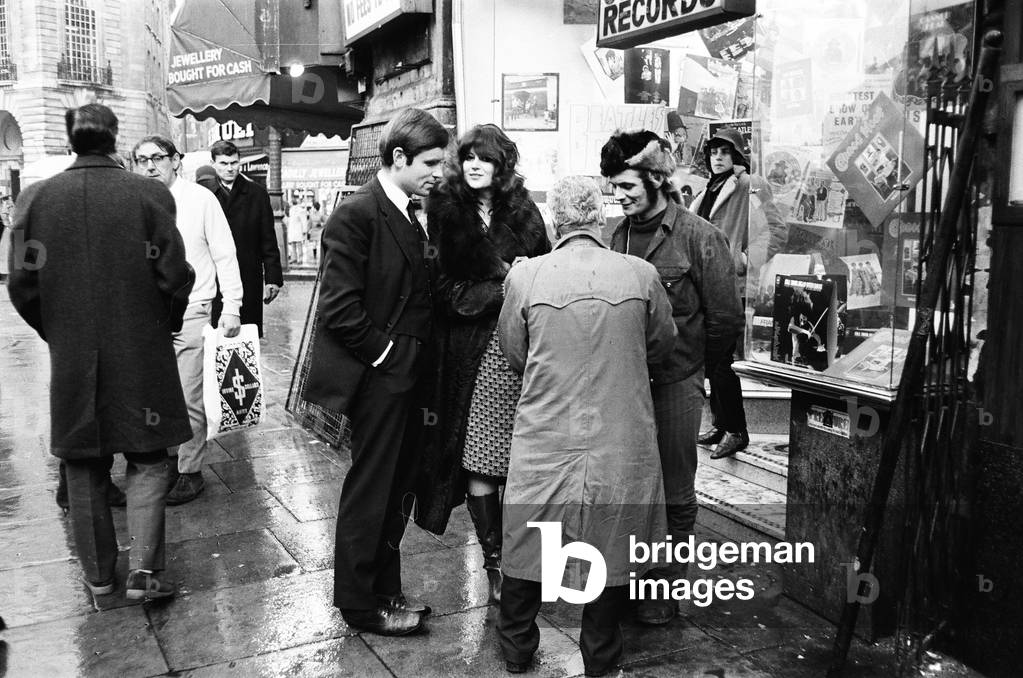 Jeffrey Archer MP in Piccadilly today with Caroline Coon, who was showing the MP the drug scene in London, March 1970(b/w photo)