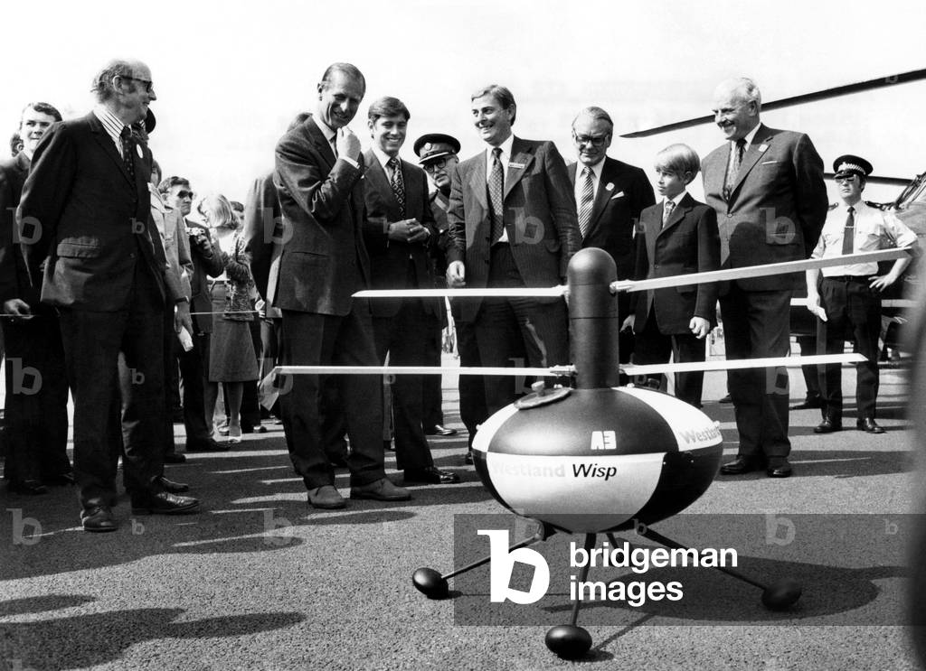 Royals Visit Farnborough Air Show: Prince Philip paid a visit to the Farnborough air show on Monday (6-9-76) with two of his sons, Prince Andrew and Prince Edward.1976 (b/w photo)