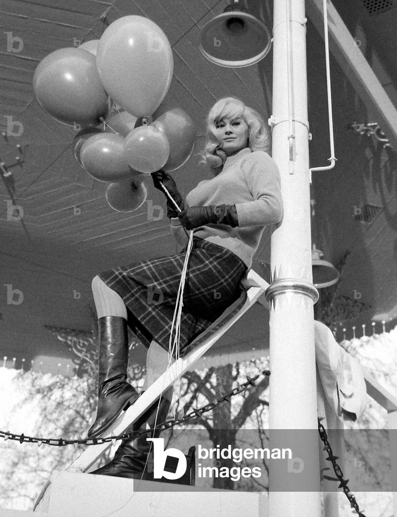 Anita Ekberg pictured on location in London Hyde Park Wednesday, to film the ABC Murders, 2 December 1964 (b/w photo)