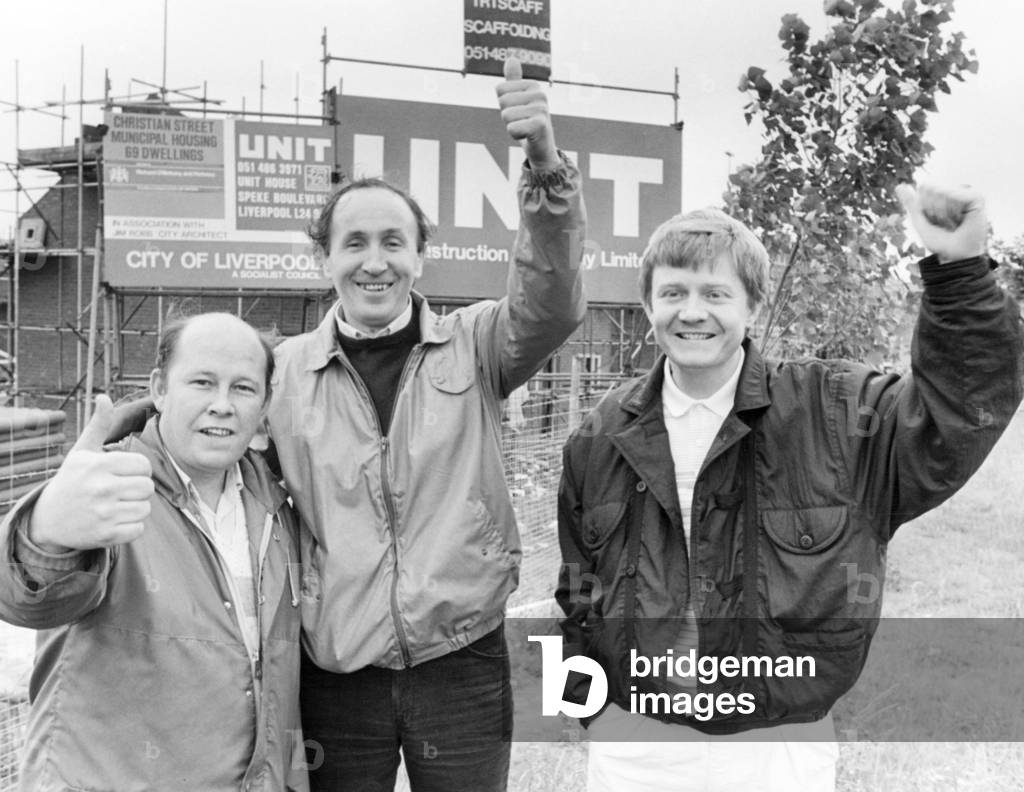 Members of the Gerard Community Housing Tenant Participation scheme, secretary Joe Ker, chairman John McShane and design chairman Joe Linnett, on the site of the new homes being built just across the road from Gerrard Gardens. Gerard Gardens was a tenement block in Liverpool city centre, designed and built in the 1930s. 7th August 1986 (b/w photo)