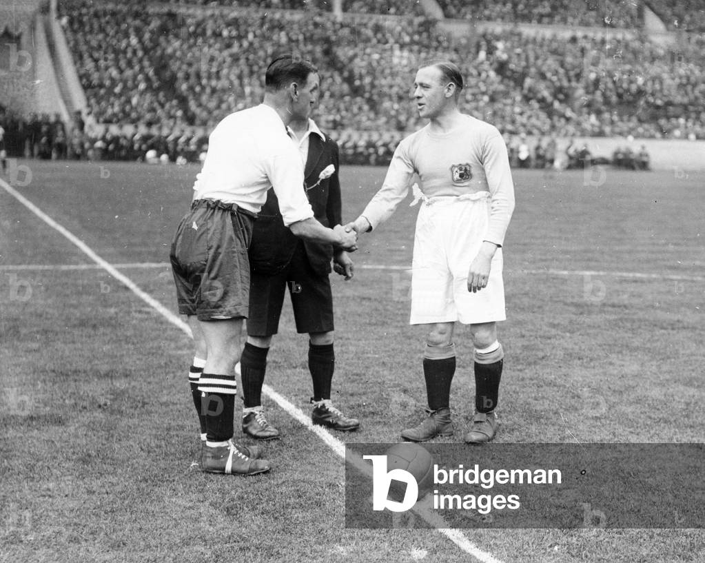 1926 Cup Final at Wembley. Joe Smith (left) of Bolton and McMullan of Man. City shake hands before the match, 24th April 1926