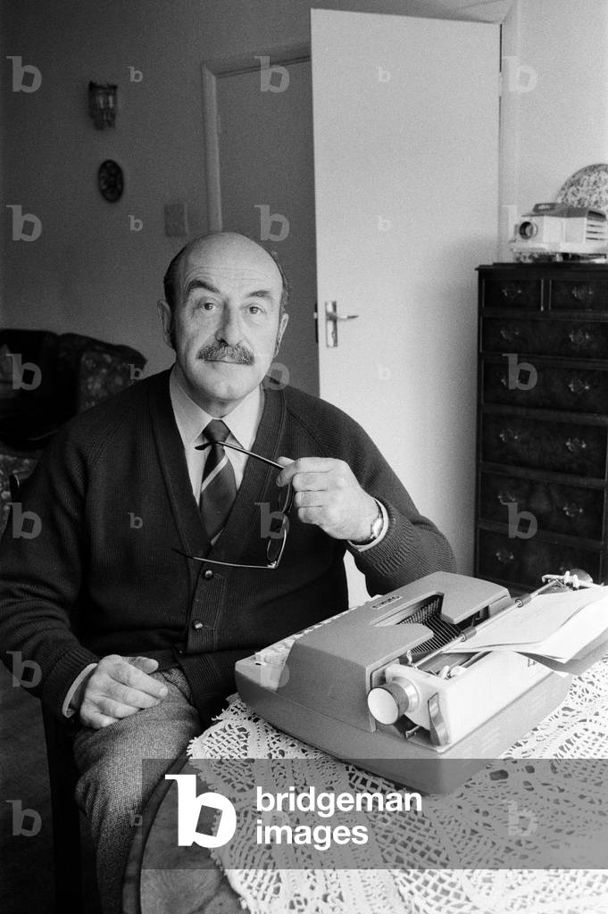 Comedy script writer Talbot Rothwell at work in his Fulking, Sussex, home. He doesn't have a study - makes do with the dining room or a corner of the sitting room., 29th April 1970 (b/w photo)