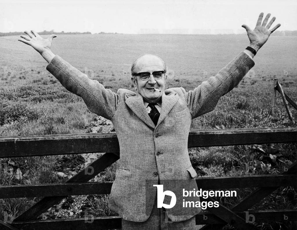 Henry Frederick Houghton, who spied for the Russians, stops for a cigarette after being released from prison having served 9 of his 15 year sentence, 13th May 1970 (b/w photo)