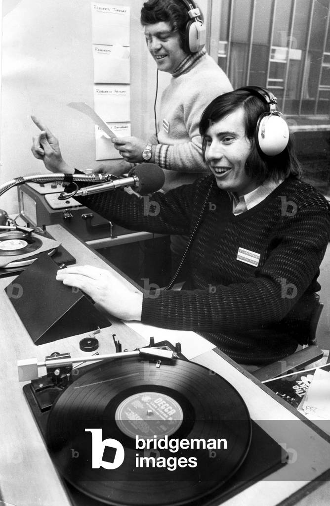 It's the Big D Show at Radio Walsgrave. Disc jockey Dave Stephenson(right) and technician Tom Wadrop set their record request programme rolling. Walsgrave hospital, Coventry.
14th July 1972