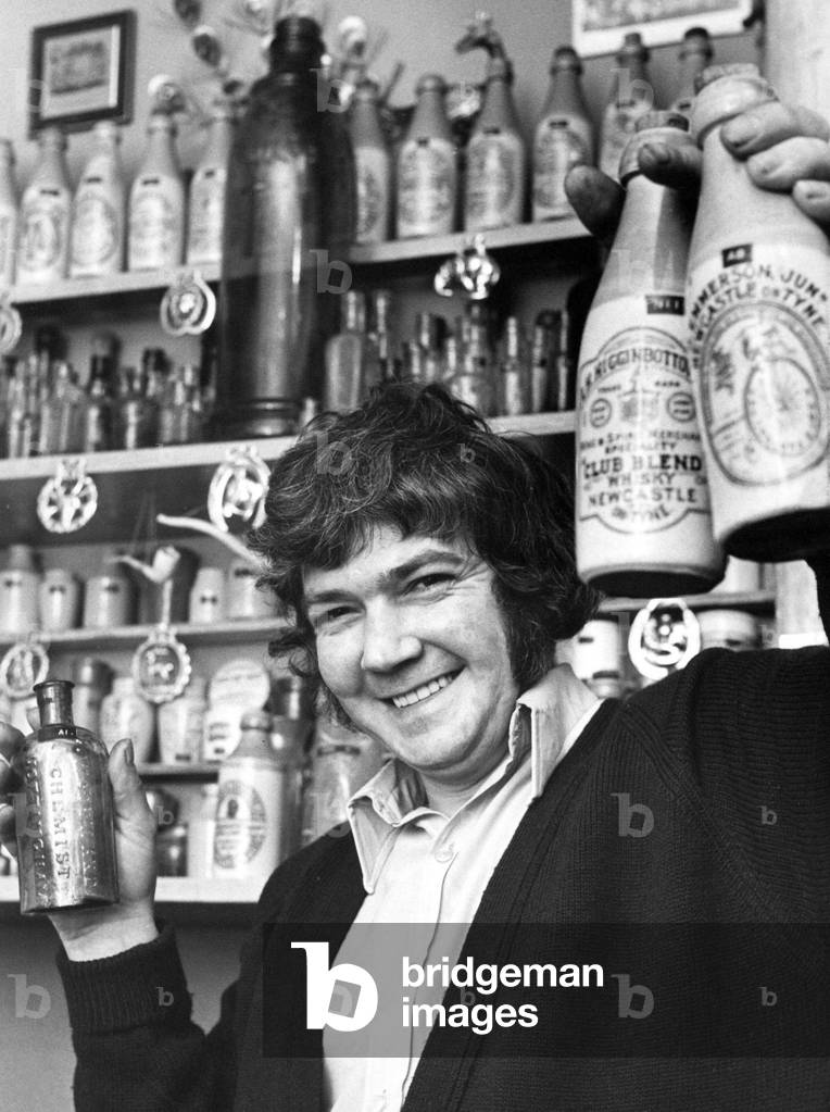 Dave Gegg with part of his collection of old bottles