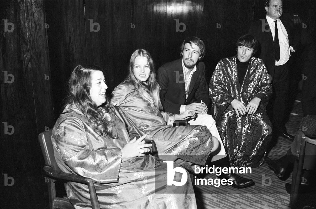 American singing group The Mamas and the Papas seen here in London, l-r, Cass Elliott, Michelle Gilliam, John Philips and Denny Doherty. The group held a press conference following the release of Cass Elliott from police custody after she was arrested for the alleged theft of two blankets from a Kensington Hotel earlier on in the year. 6th October 1967 (b/w photo)