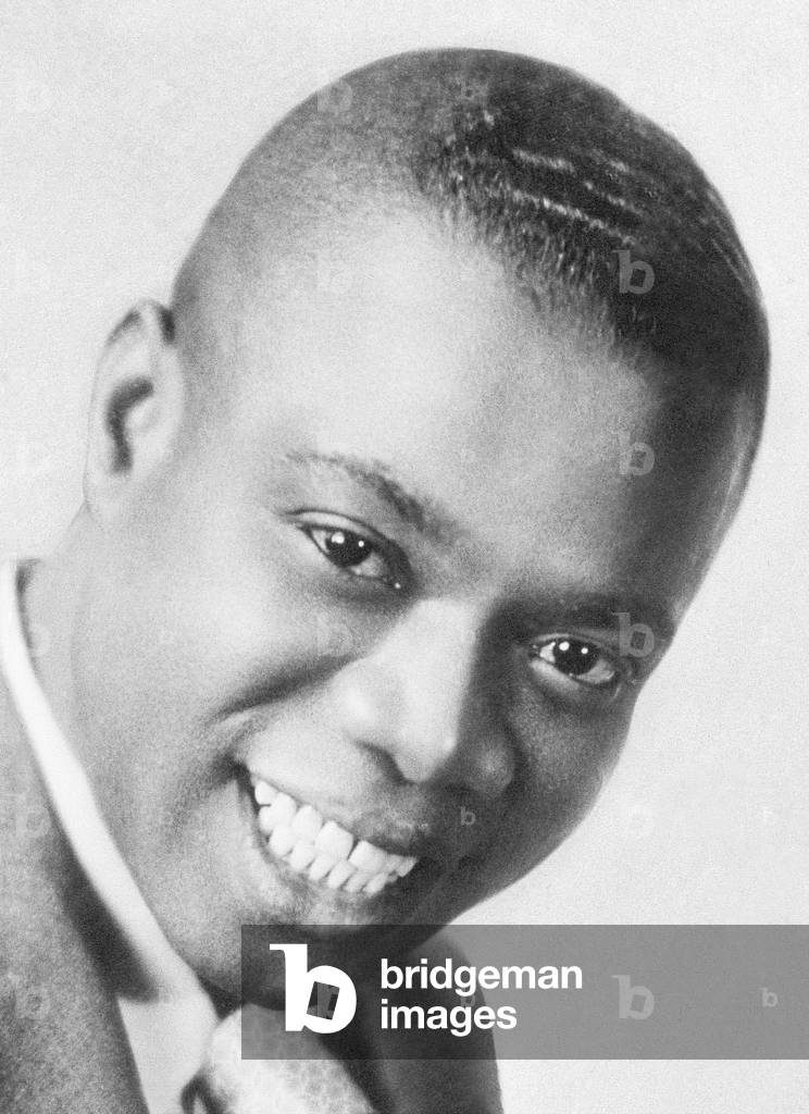 Louis Armstrong jazz trumpeter as a youth, 1932 (b/w photo)