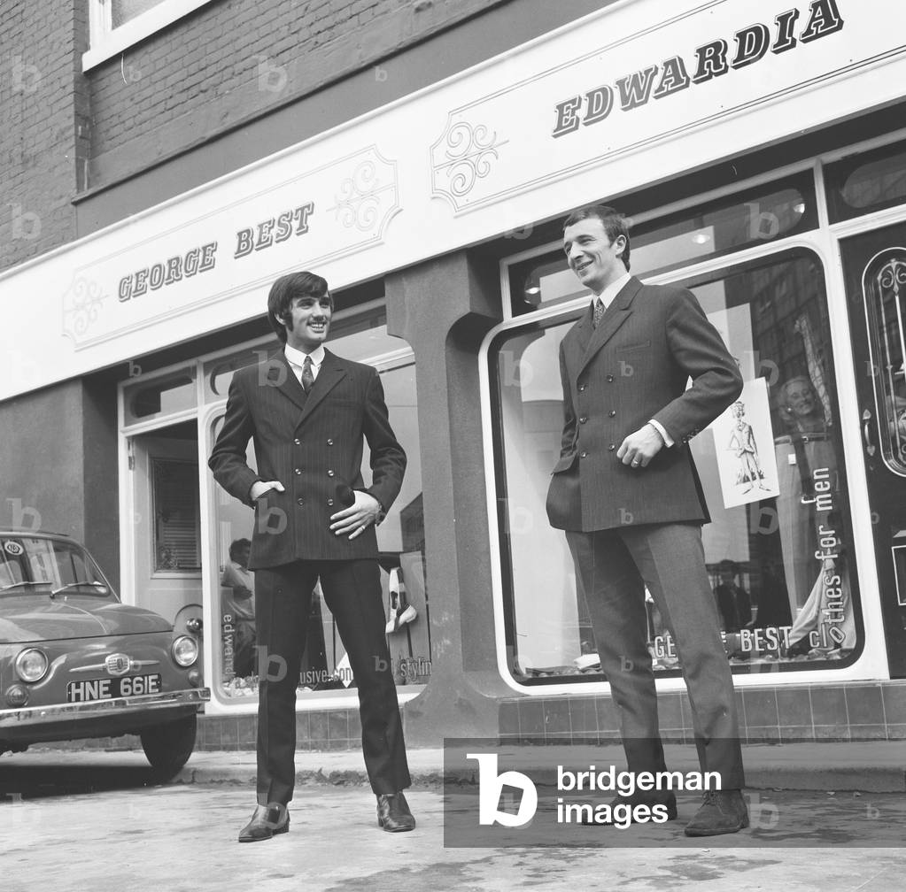 Manchester United footballer George Best celebrates the opening of his fashion boutique with friend Mike Summerbee. 14th September 1967 (photo)