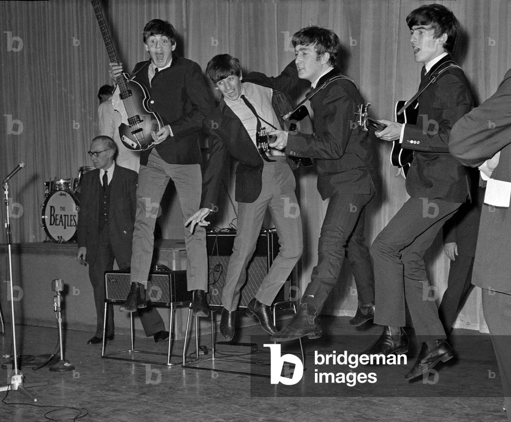 The Beatles play about and jump in the air during the rehearsals for the Royal Variety Performance at The London Paladium, November 1963
