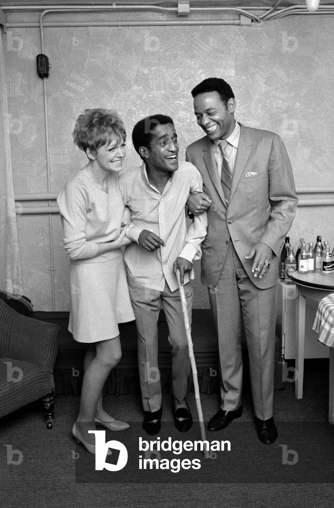 Sammy Davis Jnr with Gloria de Haven in her dressing room before the show Golden Boy at the London Palladium 8th July 1968 (b/w photo)