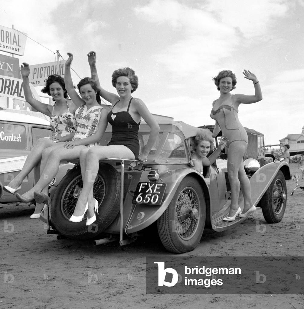 Beauty contest girls playing on the beach at Weston-Super-Mare, 7th September 1960 (b/w photo)