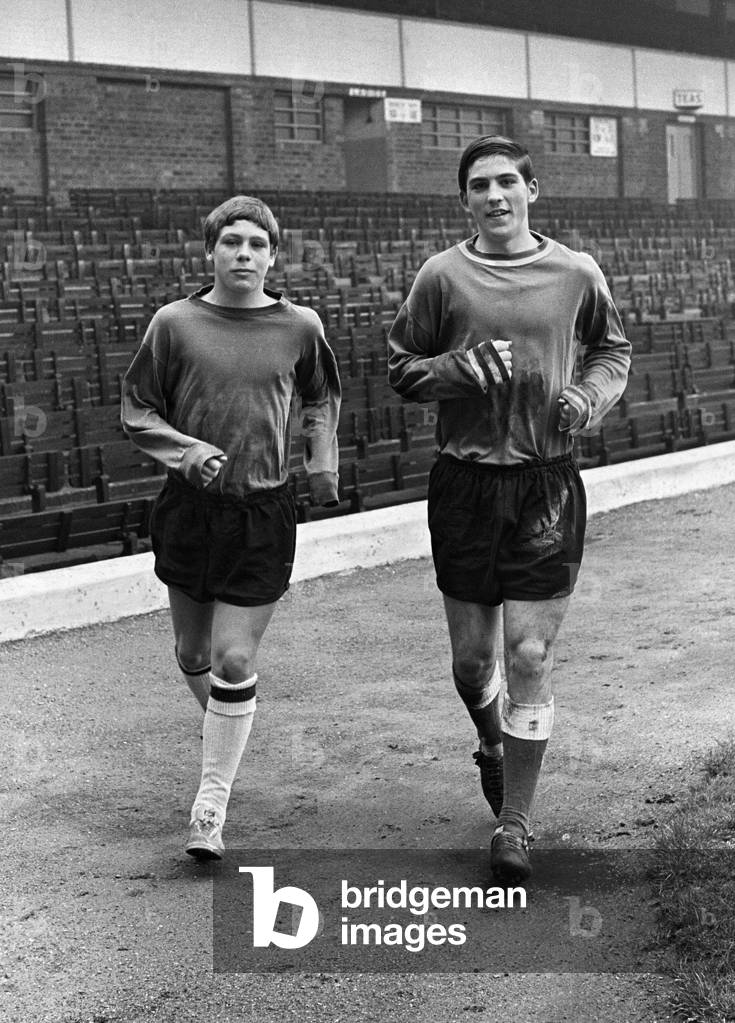 Young Birmingham City footballer Bob Latchford who has just signed his first professional contract for the club, pictured with teammate Alan Childs during a training session at St Andrews. 13th May 1967 (photo)