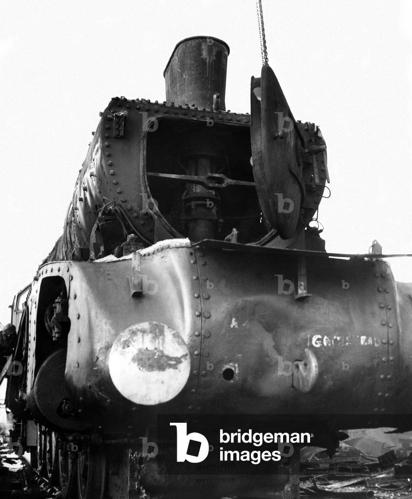 One one of the giants of the railway - now just a skeleton remains waiting to be broken up at a breakers yard at North Blyth on 5th January 1965 (b/w photo)