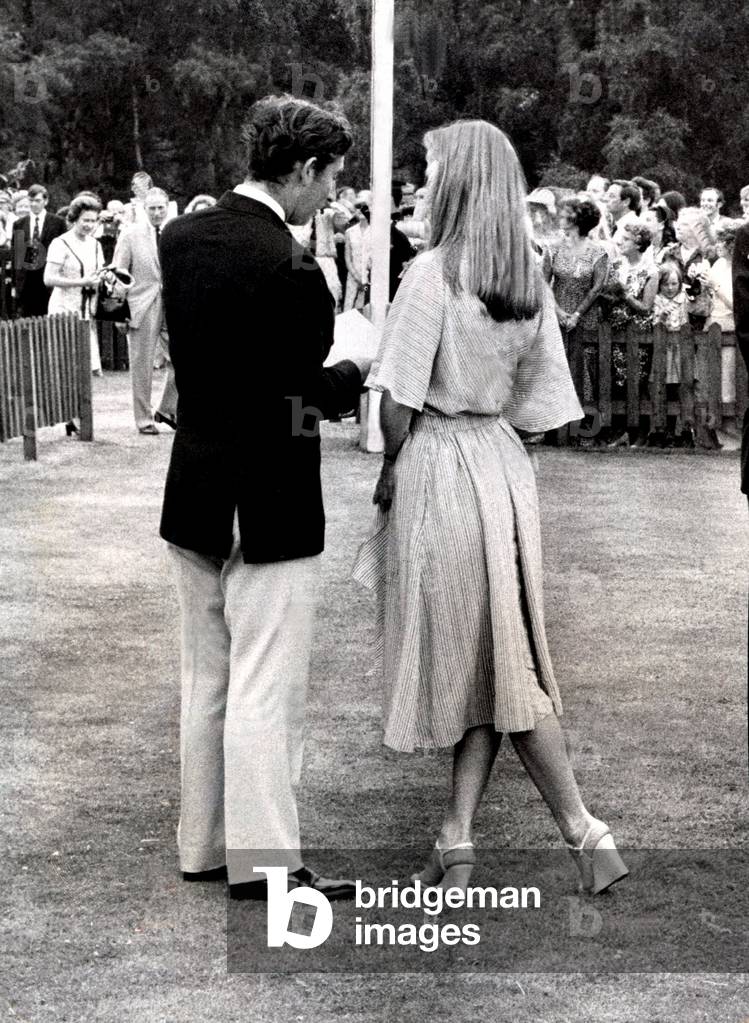 Prince Charles with Princess Elizabeth of Yugoslavia at the Wills International Polo on Smith's lawn, Winsdsor. 
1975