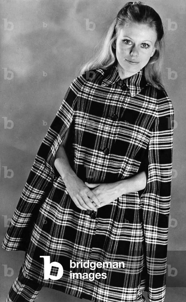 Scotch on the rocks. For girls who like their tartans neat, Burberry's reversible cape stays in good shape when the weather is at its worst. It is waterproof and has zip-up hand slits to keep out rain and wind on blustery days. In a choice of tartans from branches of the Scotch House. 
October 1969