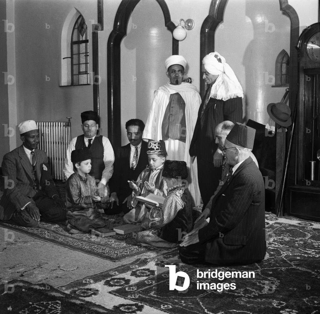 Abdullah Satar at an Arab Ceremony in a Cardiff Mosque before leaving on a pilgrimage to Mecca. September 1949 O20086
