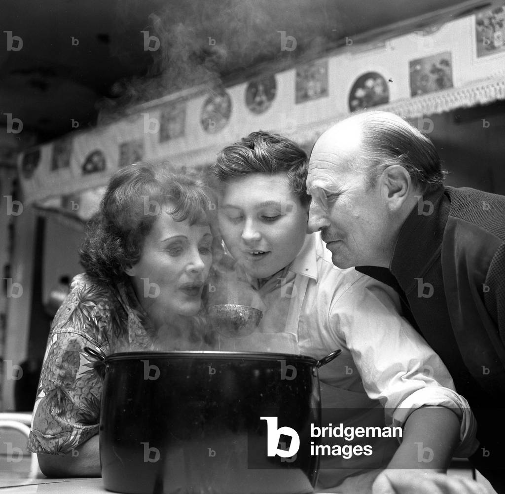 Fanny Craddock's Kitchen Right Johnny Craddock with pupil cook John Harper seen here with TV cook Fanny Craddock, tasting her latest creation, October 1962 (b/w photo)