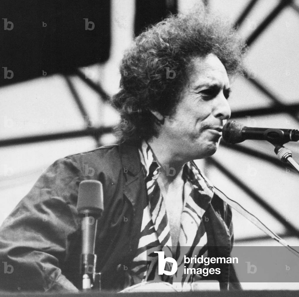 Singer Bob Dylan in concert at St James's Park, Newcastle 5 July 1984 (b/w photo)