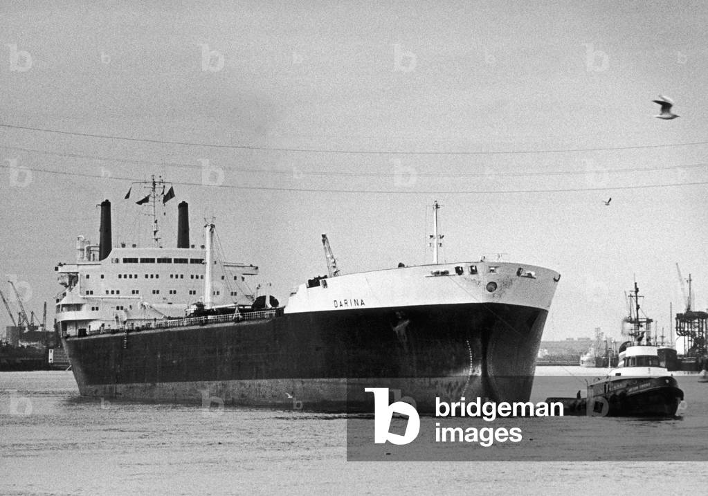 The shuttle tanker Darina seen here being towed to her berth at the Shell oil terminal. 22nd September 1979 (b/w photo)