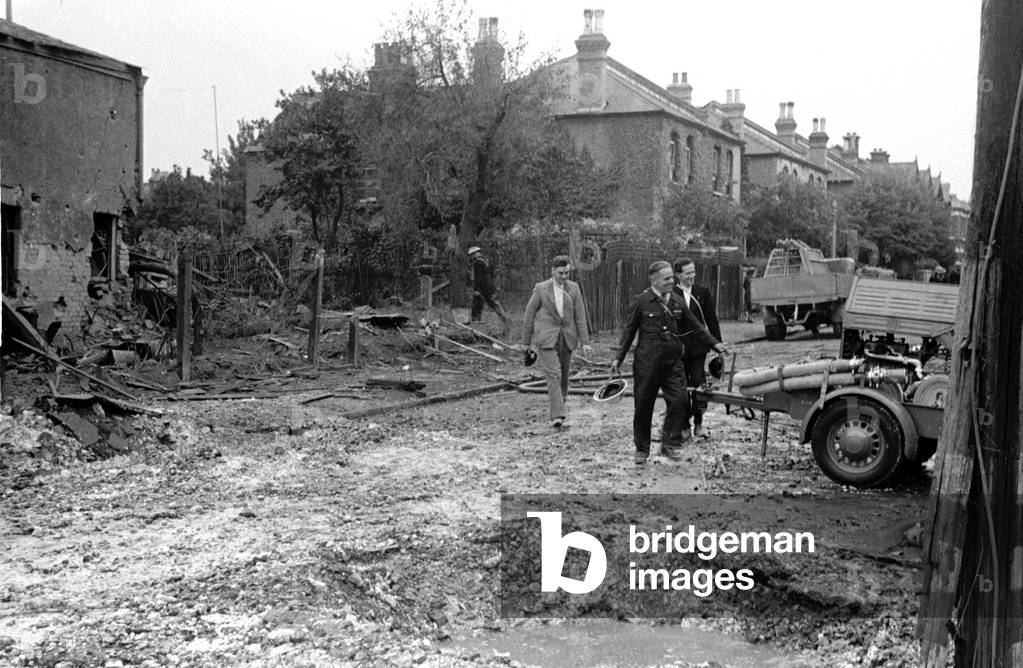 Alfieri. Air Raid damage, Malden.
ARP Wardens and Fire services at work.
August 16th 1940