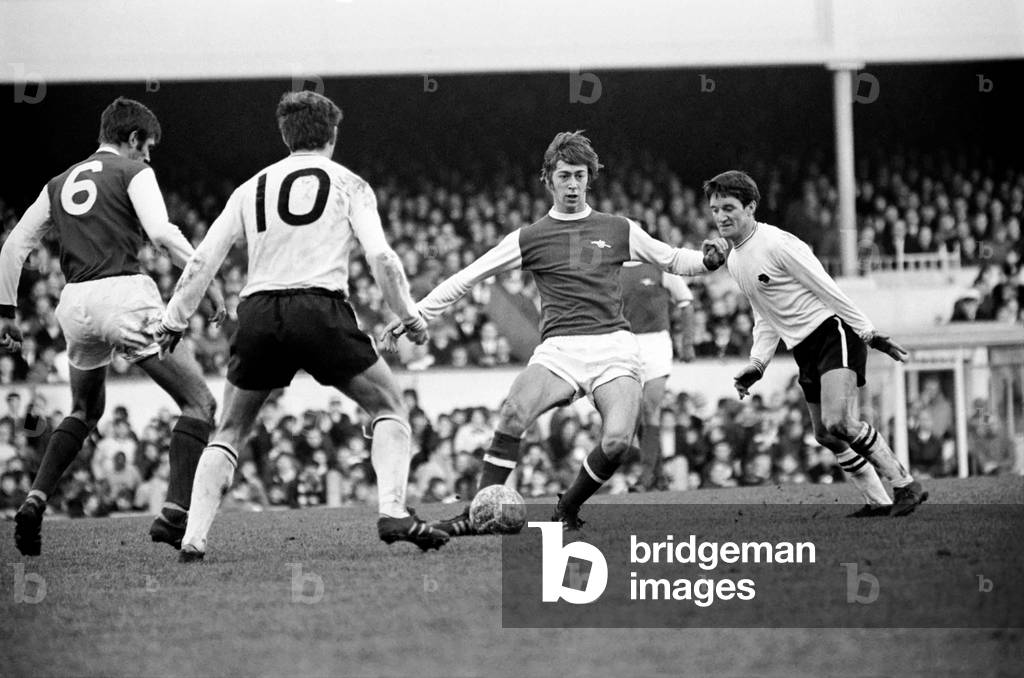 English League Division One match at HighburyArsenal 4 v Derby County 0. Arsenal's Charlie George on the ball with Willie Carlin (right) Kevin Hector and Peter Simpson. November 1969 (photo)