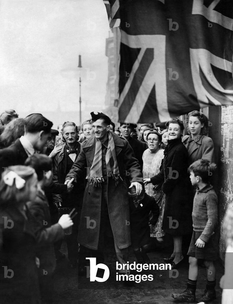 World War II P.O.W.'s: Rifleman John West, a prisoner-of-war repatriated from Germany, arrived home at Bridforth Place, Hoxton, 31st October 1943 (b/w photo)